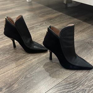 Black suede/leather high heel bootie. Almost perfect condition.